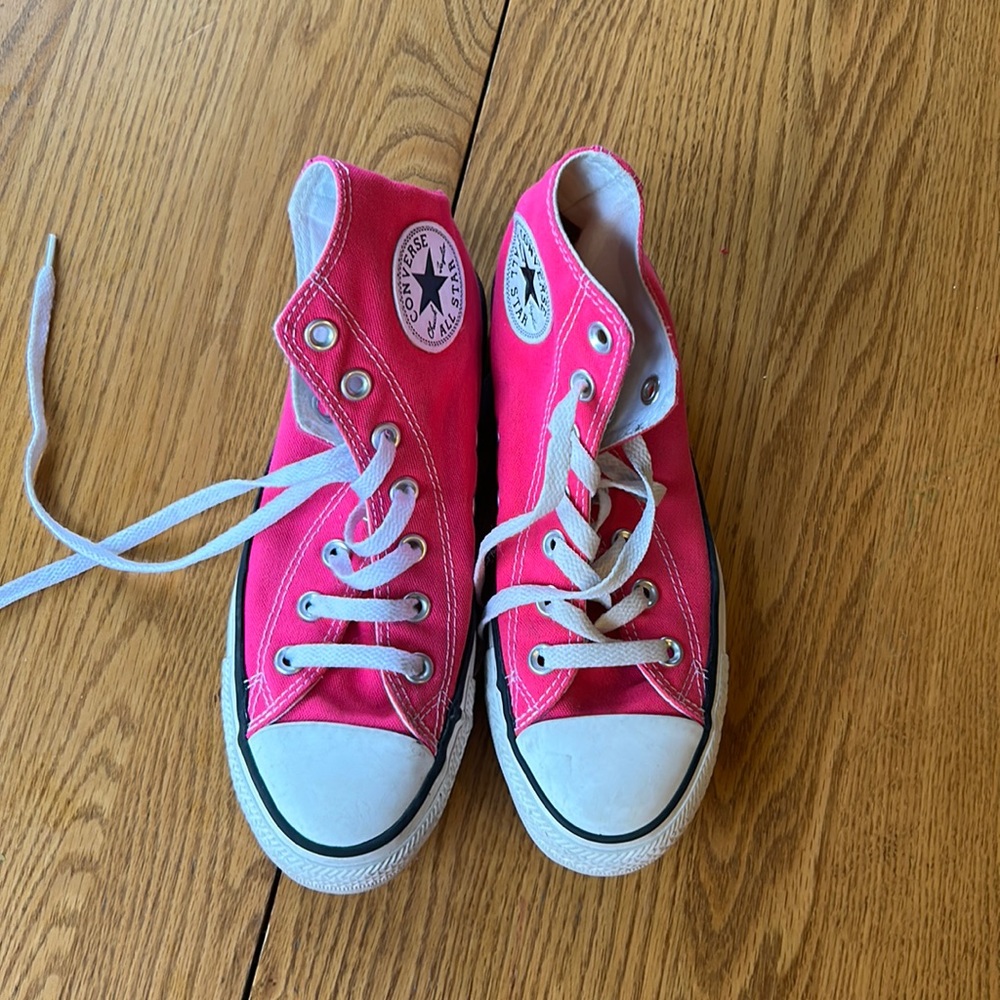 Hot pink high tops converse